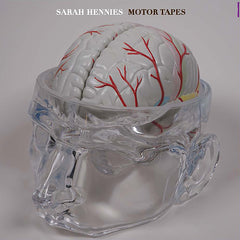 Album cover featuring a clear plastic sculpture of a head and brain, with red markings, on a white background with the text 'SARAH HENNIES MOTOR TAPES'.