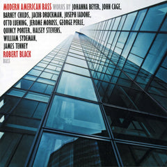 Cover art for album entitled "Modern American Bass" with Robert Black performing works by several American composers. The featured image is a photograph of a tall glass building, with the reflection of light against the windowpanes producing a grid effect.