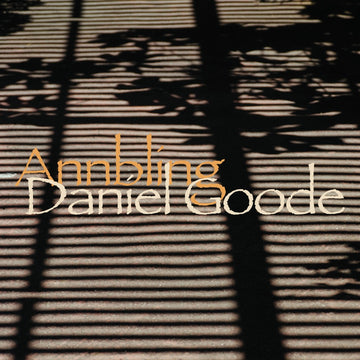 Album cover for Daniel Goode: Annbling featuring text and a shadowed geometric pattern background.