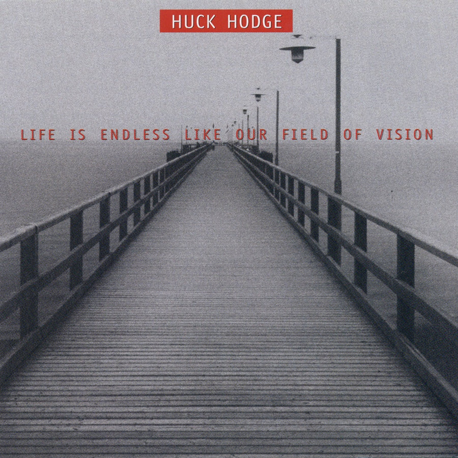 CD cover featuring a black and white image of a bridge or pier with a text overlay that reads 'Huck Hodge - Life Is Endless Like Our Field Of Vision'.