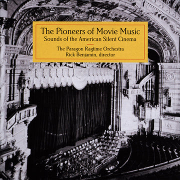 Cover of the CD titled 'The Pioneers of Movie Music' featuring a black and white photograph of an old cinema with a grand piano on stage and The Paragon Ragtime Orchestra branding.