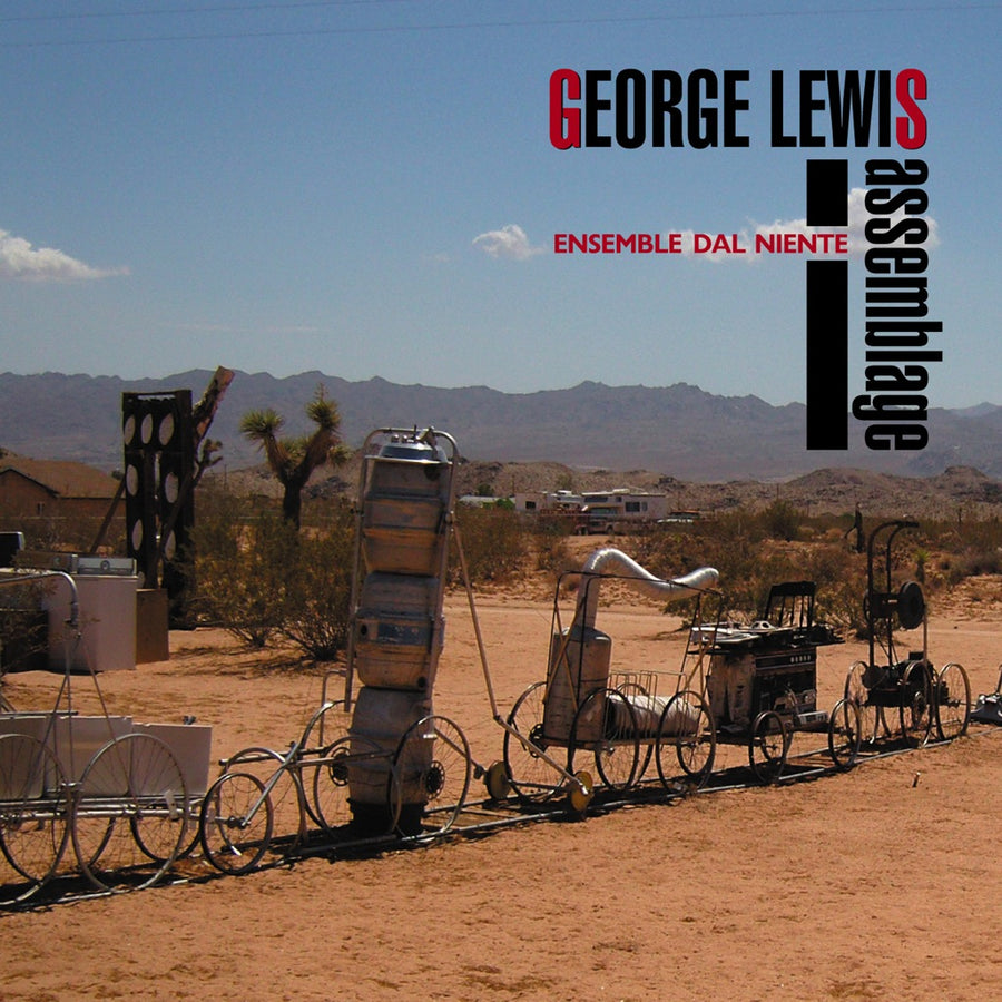 Cover art for George Lewis' Assemblage album featuring an outdoor scene with various mechanical and non-mechanical objects arranged in a line, set against a desert landscape with mountains in the background.